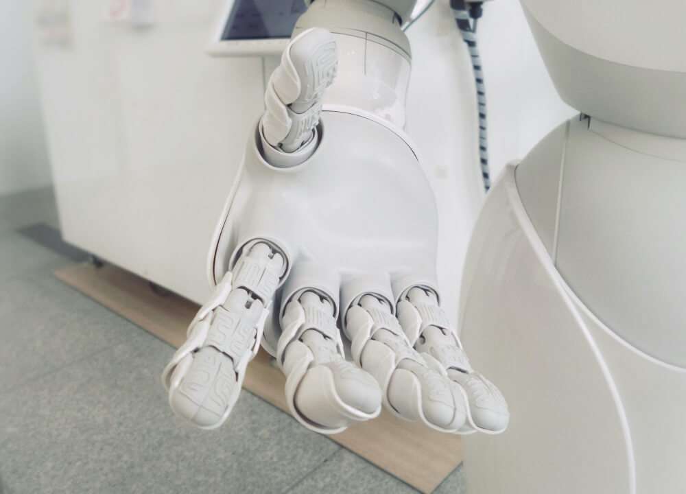 Robot hand open toward viewer